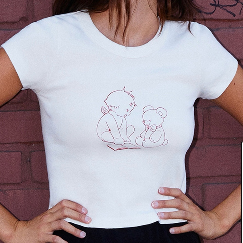 Preowned lightly worn John Galt short sleeved, cropped t shirt size women’s S.